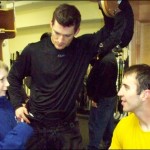 Logan in the Boston Bruins dressing room in March. Zheno Chara (right) climbed Mount Kilimanjaro to raise funds for improving lives in Africa and Andrew Ference (left) is active in supporting African communities.