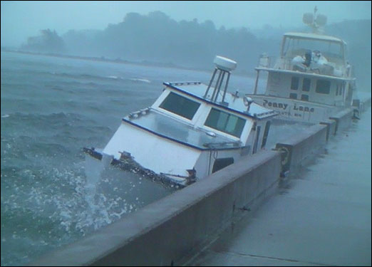 Boats seeking refuge were getting knocked around as Hurricane Bill arrived at the Bedford Waterfront on Sunday morning.