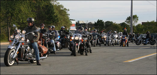 On Friday night, members of the Red Knights Motorcycle Club, comprised largely of firefighters, led a motorcycle ride to honour the firefighters who died in the 9/11 attacks in New York City eight years ago. The first annual 9/11 memorial ride, which was open to all riders, started in the parking lot of the Bedford Place Mall (pictured) and travelled through the city.    