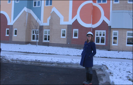 Holly MacLean, Public Relations Officer, stands in front of Northwood West Bedford Continuing Care Centre. The centre is scheduled to open in April 2010.