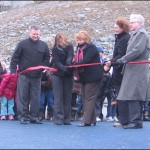 Bedford South School principal Derek Carter (left), co-chairs of the playground committee Jacalyn Leeco and Lori Shea, HRM Park Planner Therese Delorme and Bedford Councillor Tim Outhit get ready to cut the ribbon.