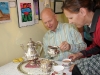 Geoff Regan, Liberal MP for Halifax West, serves tea at the Scott Manor House.