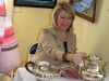 Kelly Regan, Liberal MLA representing Bedford-Birch Cove, serves tea at the Scott Manor House.