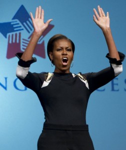 So what’s a feminist like me doing talking about Michelle Obama’s red silk sheath?