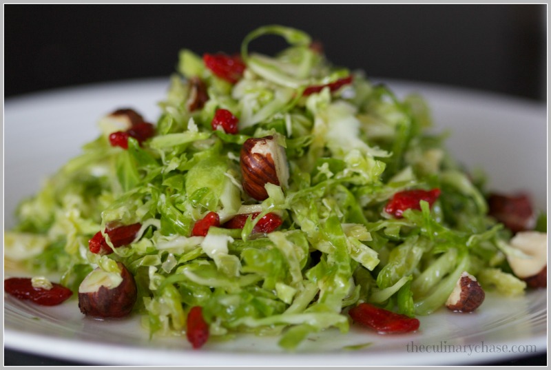 Brussels Sprout Salad with Garlic & Goji Berry Dressing