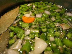 Stock ingredients covered with water and ready to be simmered 