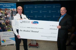 Mickey MacDonald presents cheque to Chief JM Blais.